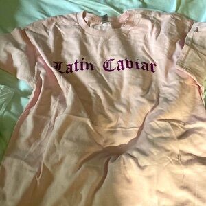 Selling Latin caviar brand medium shirt size